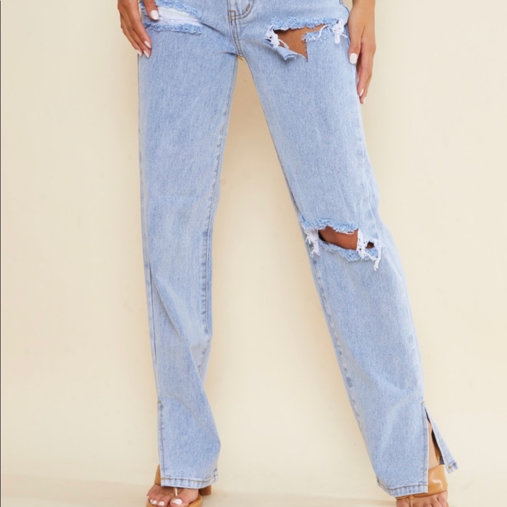Never worn with tags petite split hem distressed jeans. $28